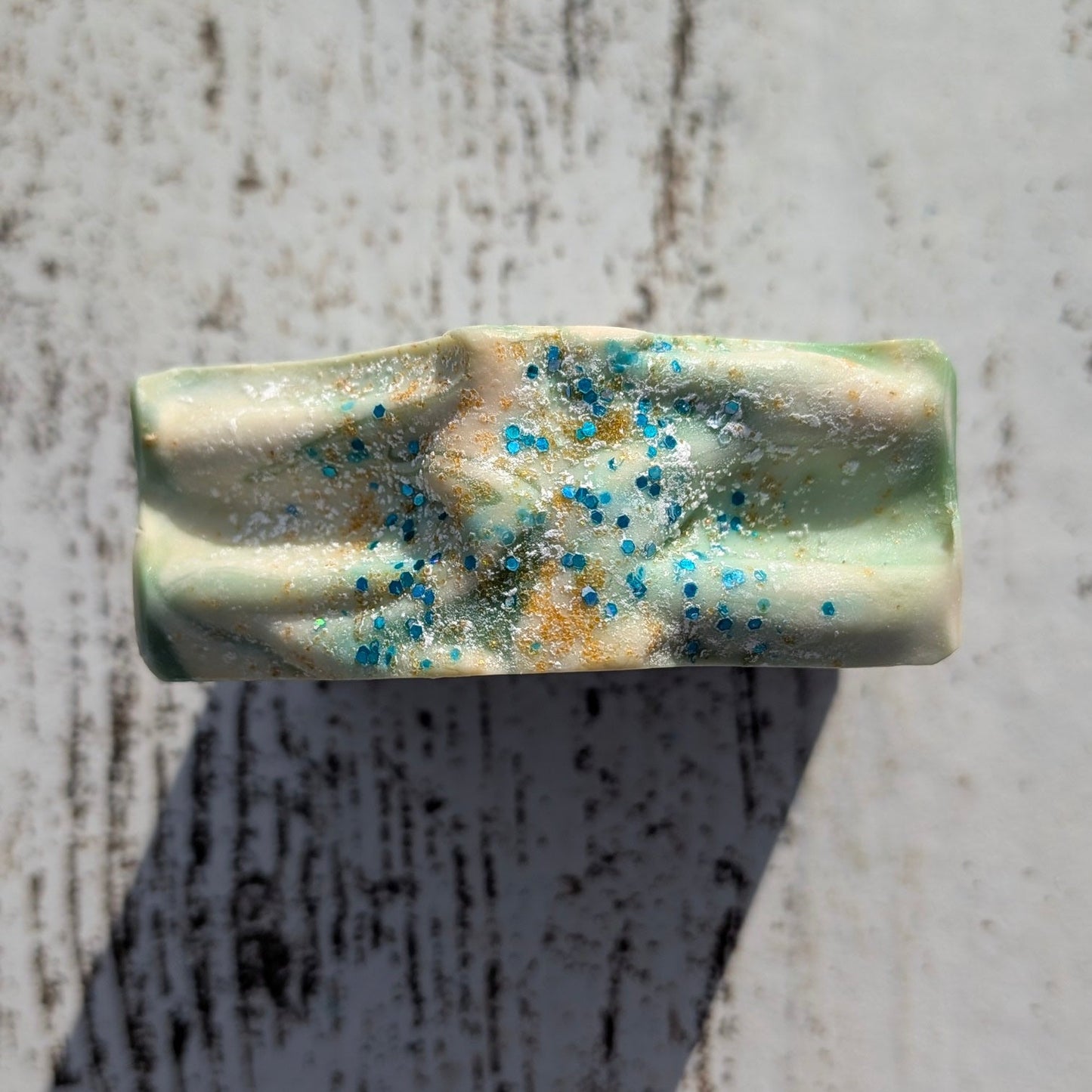 Marble soap bar with blue glitter on top